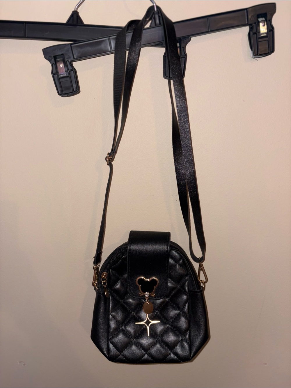 Black Quilted Crossbody Bag with Gold Charm